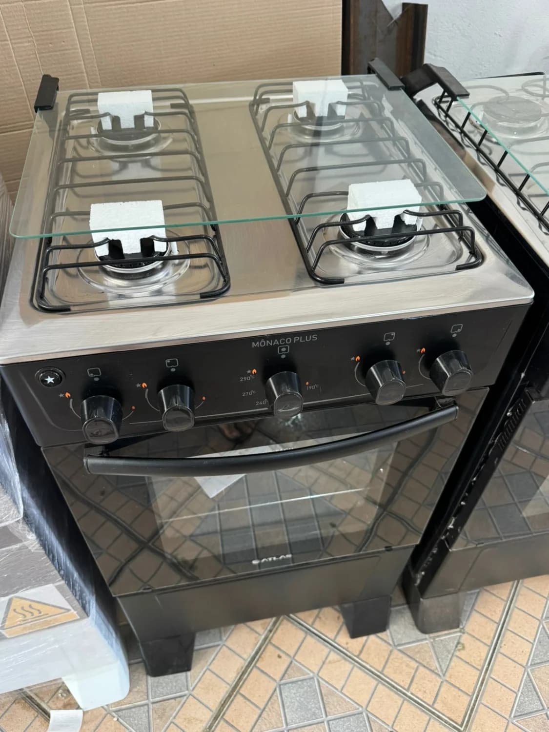 Fogão Atlas Mônaco Plus 4 Bocas com Mesa Inox e Acendimento Automático Bivolt Preto - 1