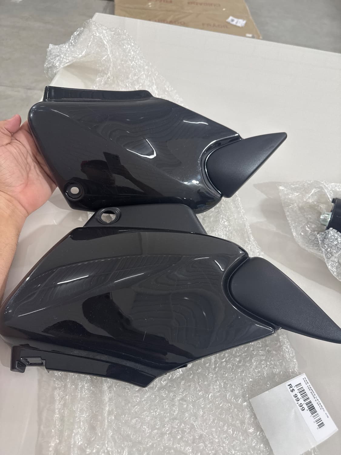 PAR TAMPA LATERAL CG FAN 125 2009 a 2013 - 1